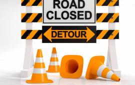 Road Closure and Detour Sign with Orange Cones