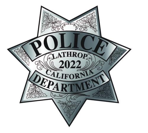 Lathrop Police Badge, 7 point silver star with black writing of "Police Department, Lathrop 2022 California"