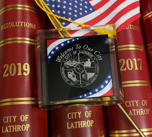 Lathrop Municipal Code Books with USA Flag and City Seal Clear Plaque
