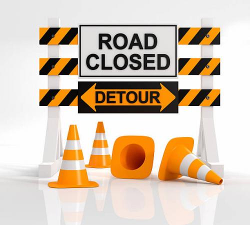 Road Closure and Detour Sign with Orange Cones