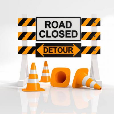 Road Closure and Detour Sign with Orange Cones
