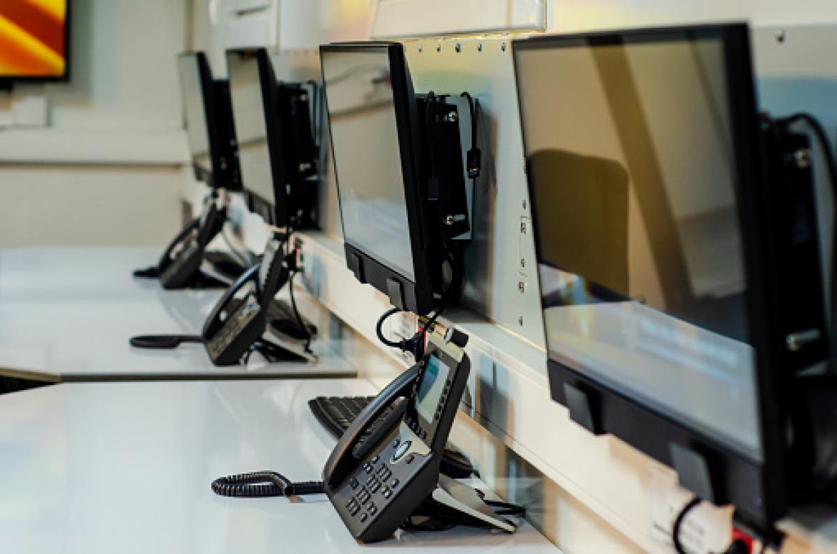 Photo of Computer Monitors and Phones